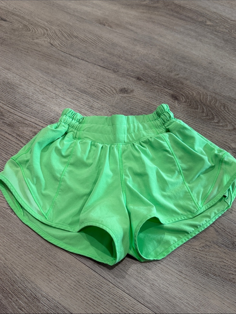lululemon athletica Women's Bright Lime Green Run Shorts hotty hot